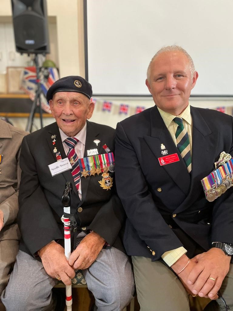 WW2 Royal Navy Veteran Neville Bowen with the Veterans Commissioner Age Cymru Dyfed.