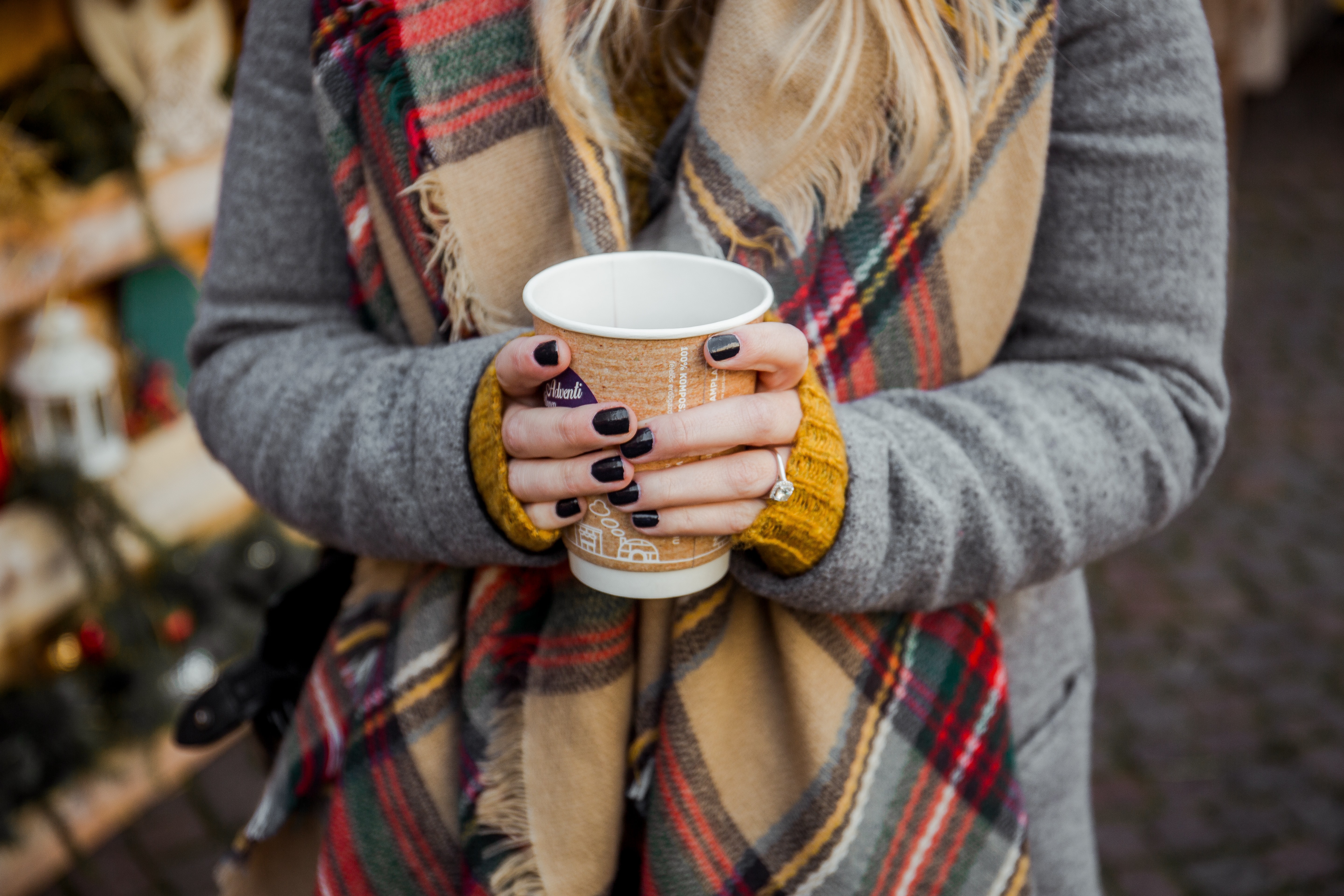 Young woman holding a cup