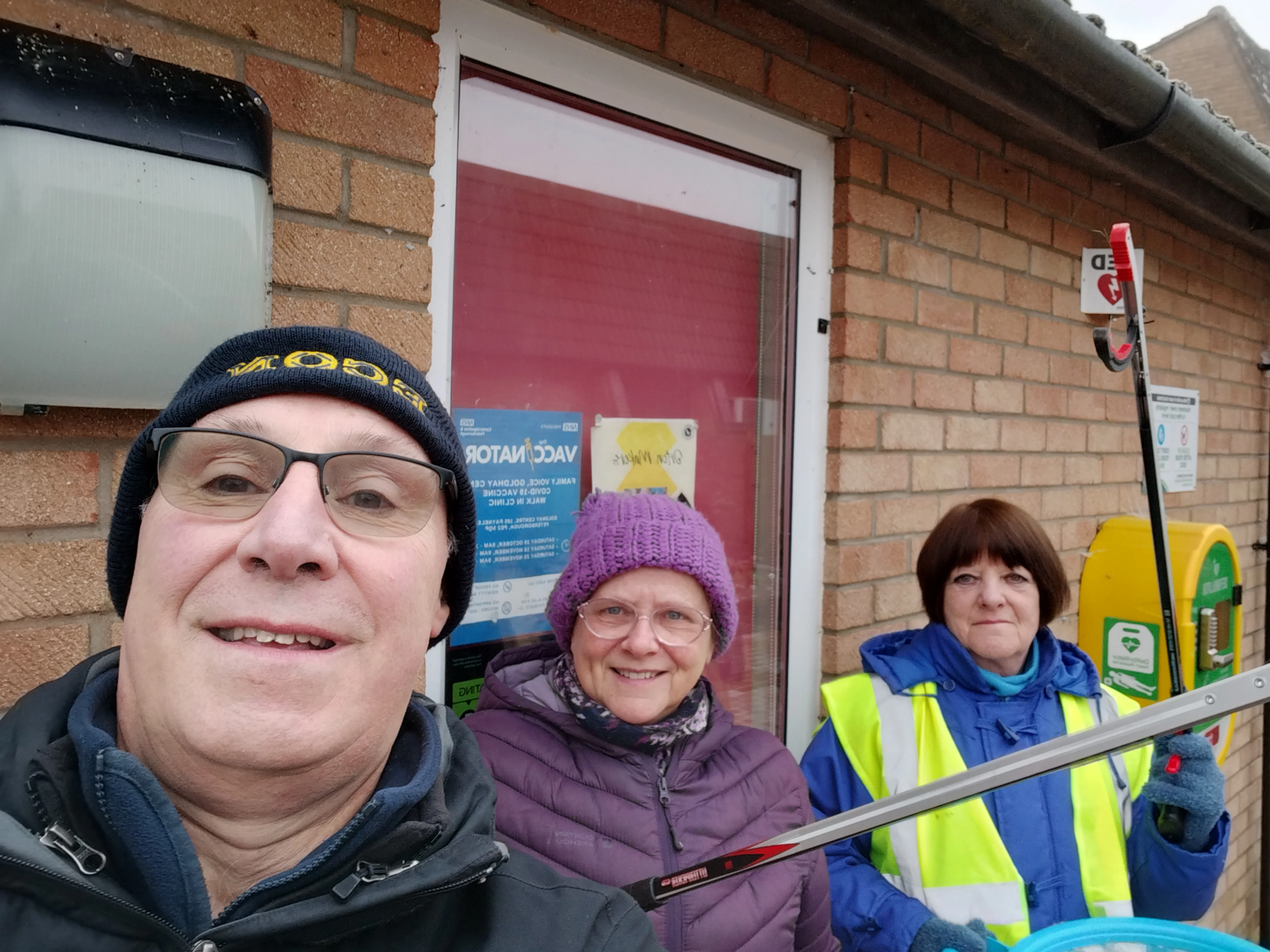 Carol litter picking with two others