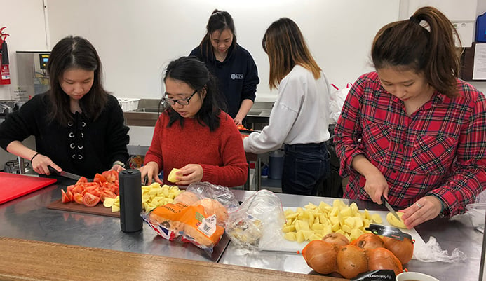 Students make Chinese New Year meal