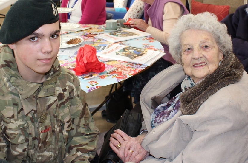 Gwen Downes with a young cadet