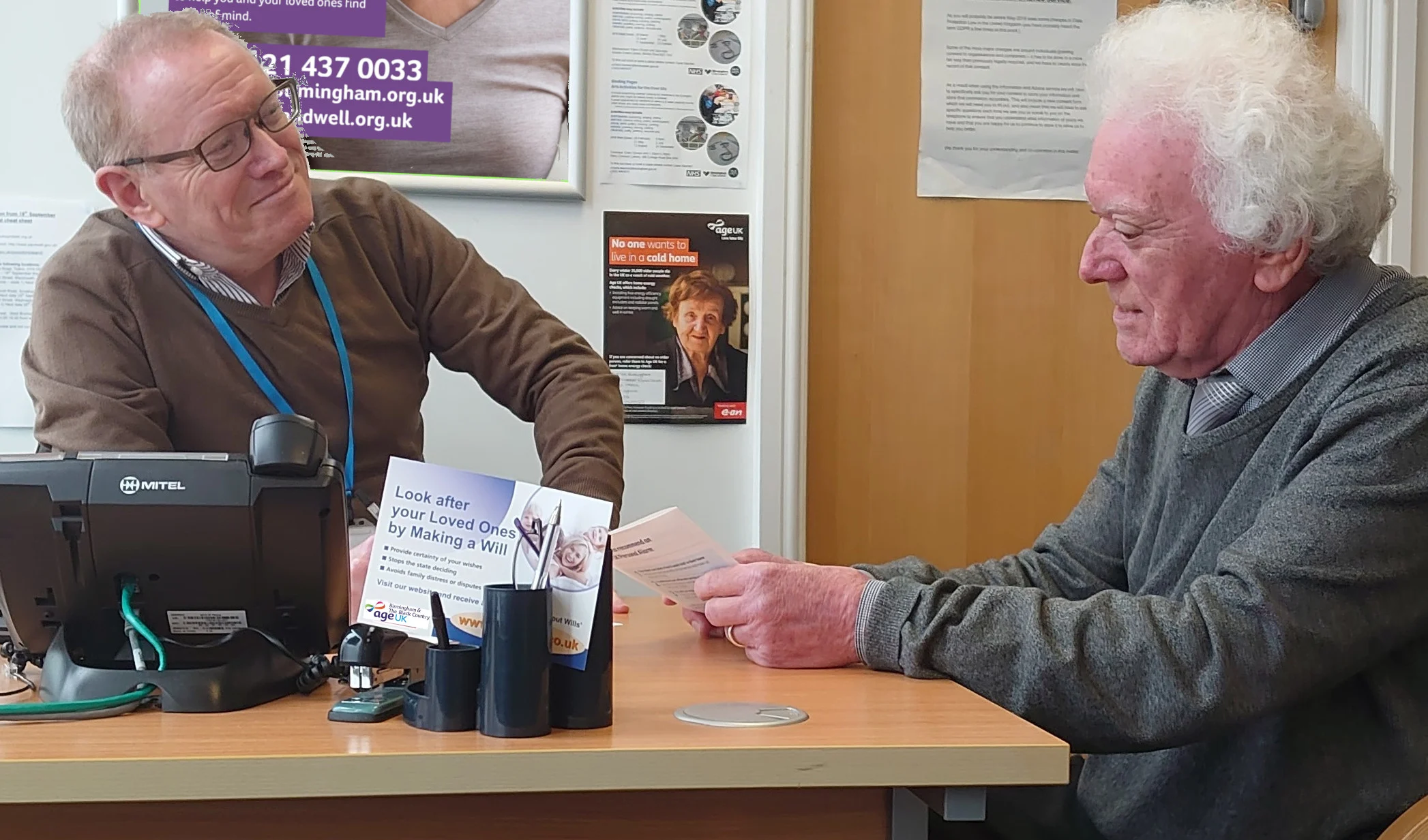 A member of our I&A team helping an older person