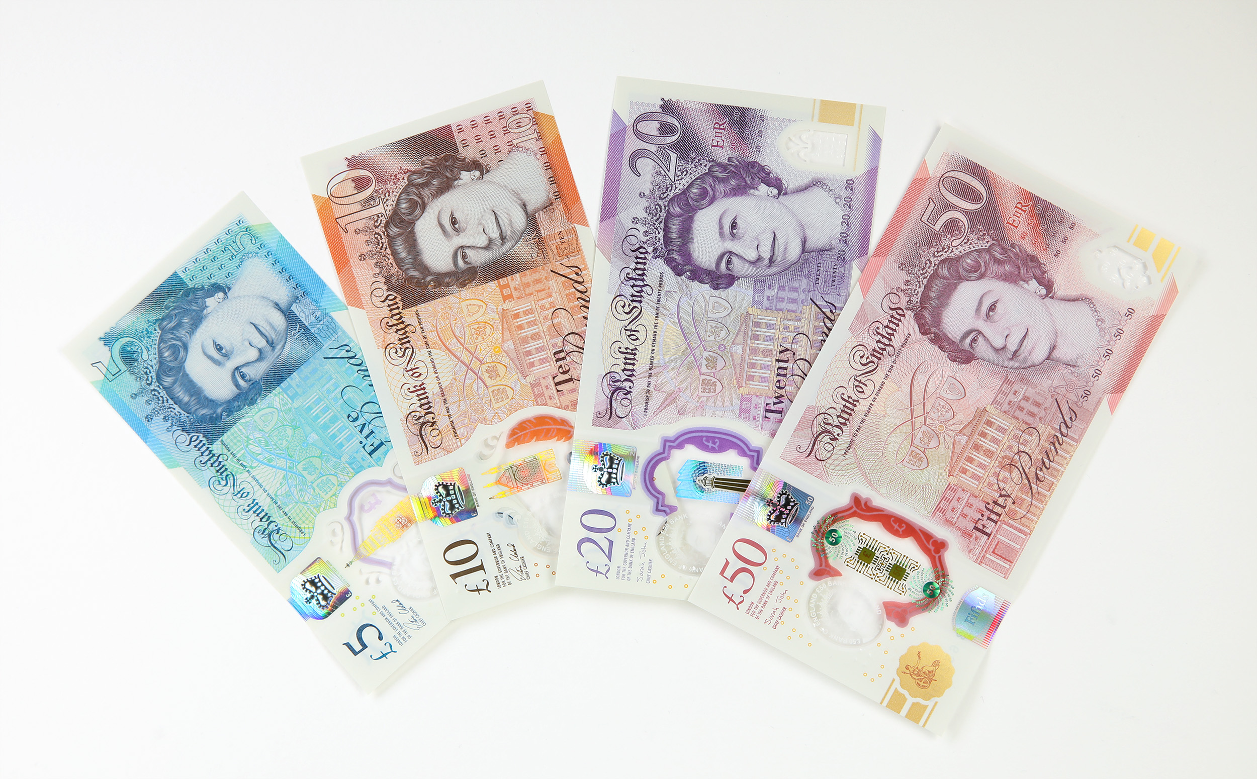 One of each of the current British banknotes