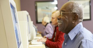 AN older gent using a computer