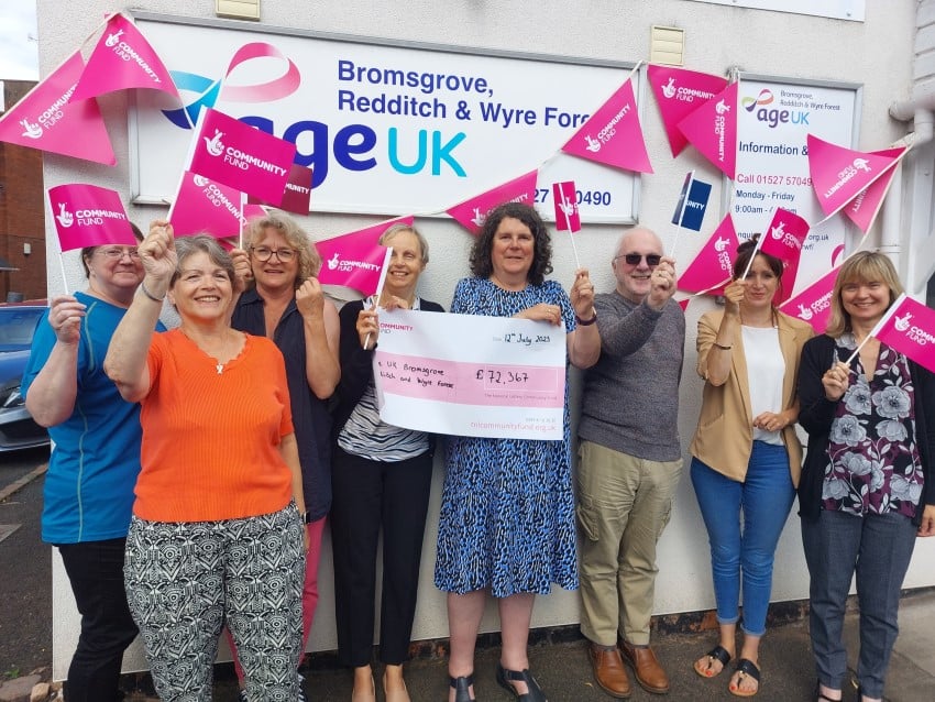 Members of the Age UK BRWF team celebrating the National Lottery Award