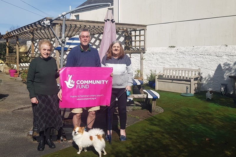 Pictured are Jeff Muir, Team Lead for Age UK’s Active Living Gardening Service along with Brenda and Wendy. And Matthew the dog!