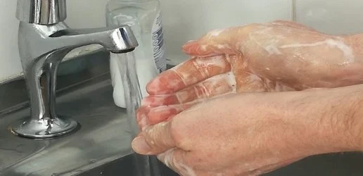 Man washing his hands