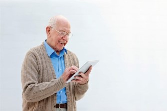 man holding a tablet