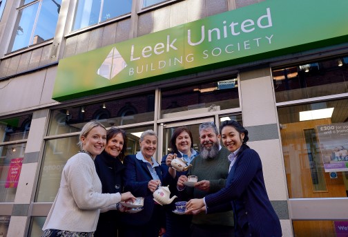 leek building society hand over donated crockery