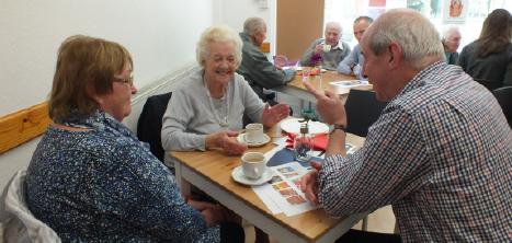 A group of people having a chat, including our CEO Martyn Rogers