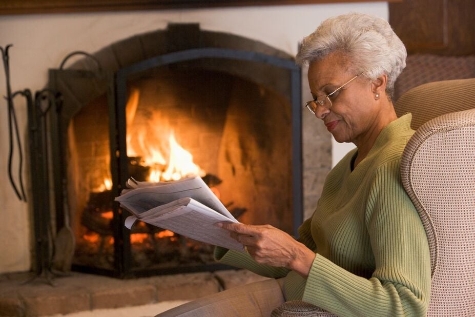 Lady reading newsletter