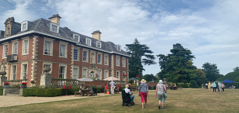 Highnam Court House with guests wandering on the lawn
