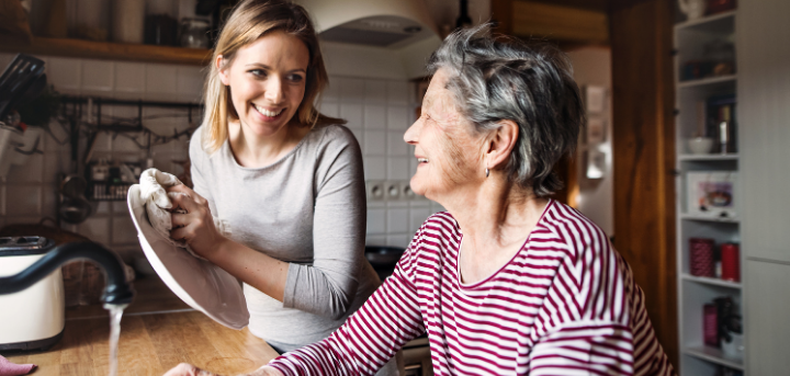 Two women doing the washing up together