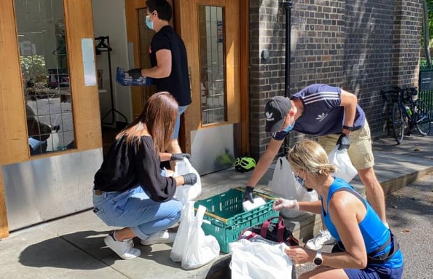 Team of volunteers coordinating food drop offs during lockdown