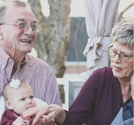 Older couple with child