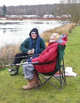 Our respite workers give much needed support to carers Pete and Harry out fishing