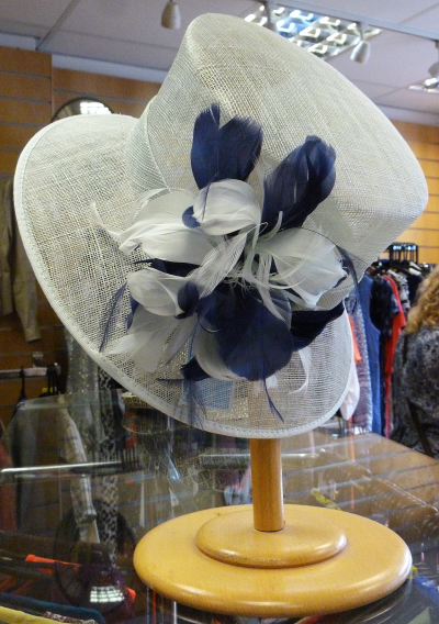 We have a wide range of high quality pre-loved clothes and apparel A charming hat on display in our Melton Mowbray shop.