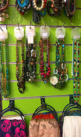 A selection of colourful beaded necklaces and bracelets in our Syston shop