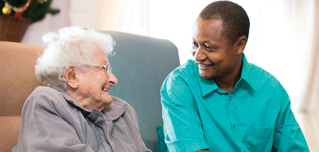 A carer with an older woman.