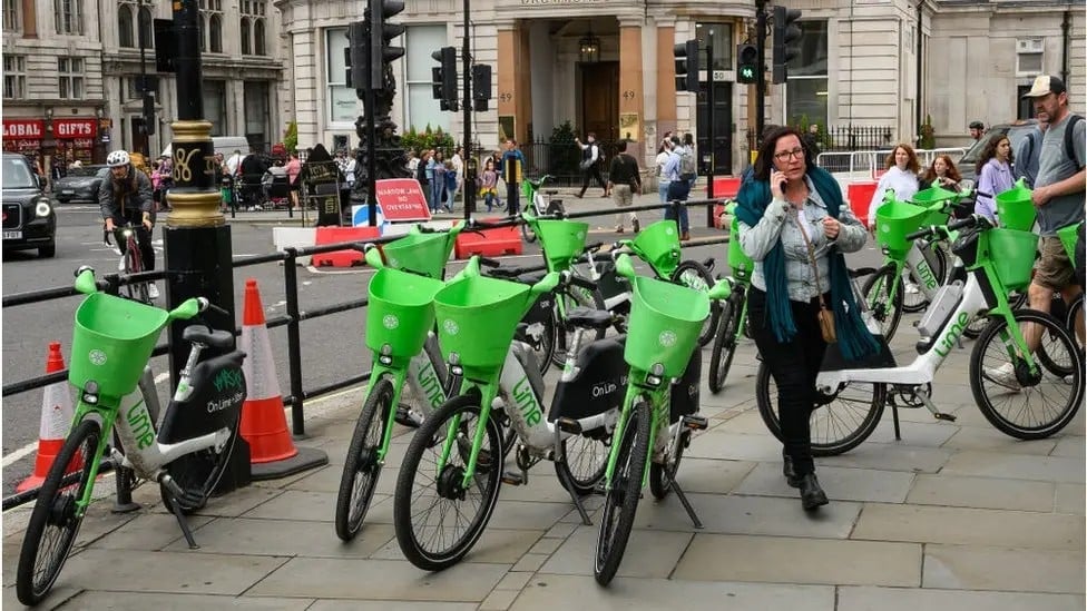 Lots of e-bikes on  London pavement