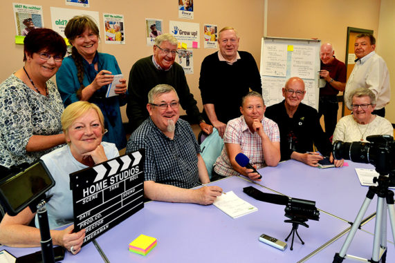 A group of community reporters, posing for a photo. 