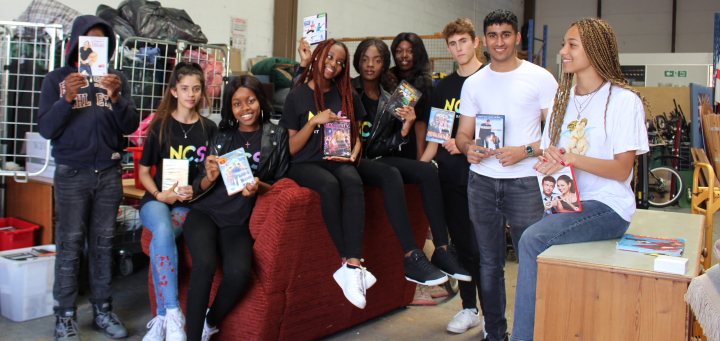 NCS volunteers helped sort the DVDs and other donations