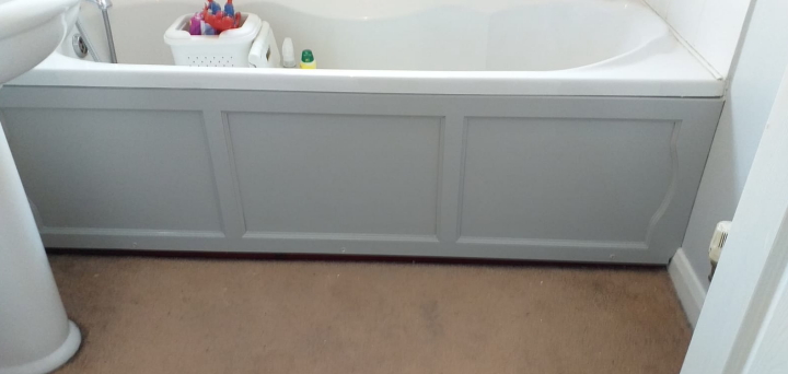 A professionally painted bath panel.