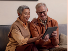 Couple looking at tablet