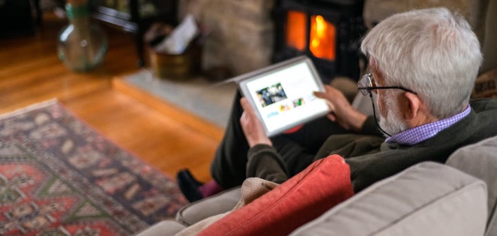 Older man using tablet