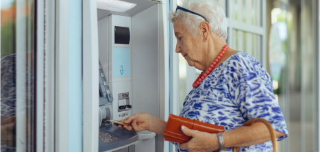 Older woman using an ATM