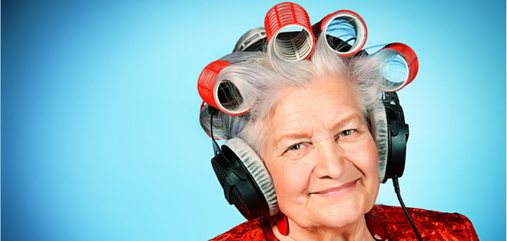 Older lady with headphones