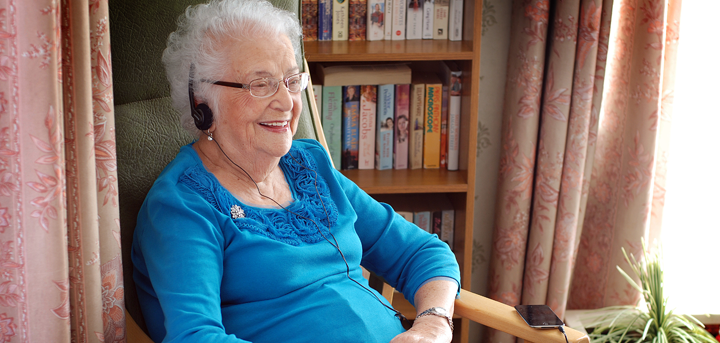 Lady listening to book