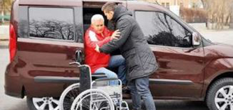 Assitance from car to wheelchair