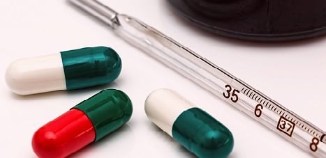 pills and thermometer