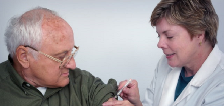 older man being vaccinated