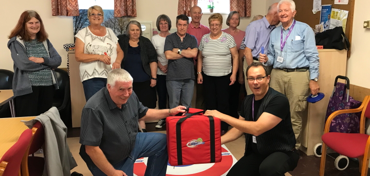 Club members are delighted to receive a new set of Kurling equipment