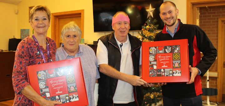 Jen and Jim were delighted to accept the gift hampers on behalf of the charity