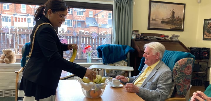 Cllr Rufia Ashraf was happy to hand out the fruit.