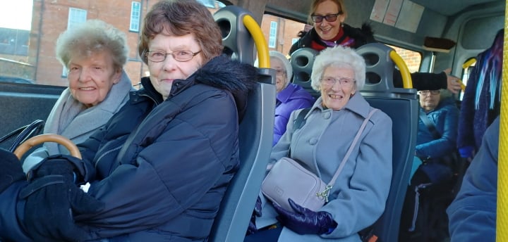 Ten excited people, on their way to the Pantomime.