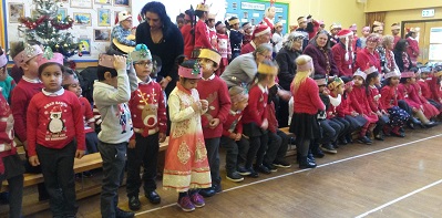 Children and older people ready for Christmas performance