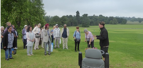 image of guide talking to volunteers