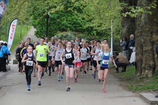 Fun run winner Emma with one of Age UK Rotherham's trustees