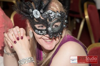 Close up of a Masquerade Ball guest in fancy mask