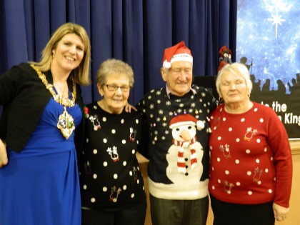 Mayor and guests wearing christmas jumpers