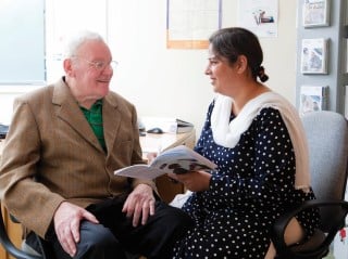 Getting advice - man and woman seated Getting advice - man and woman seated