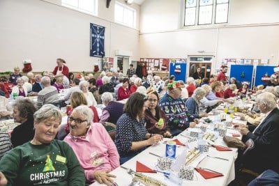 People sat eating Christmas lunch 2017