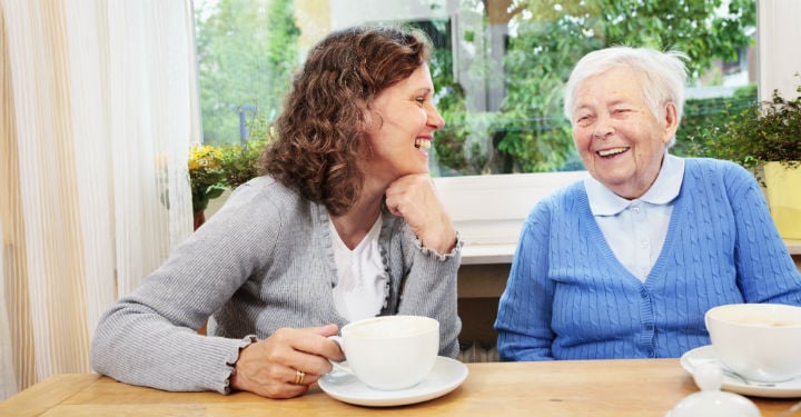 Two women at befriending service at Age UK Sheppey