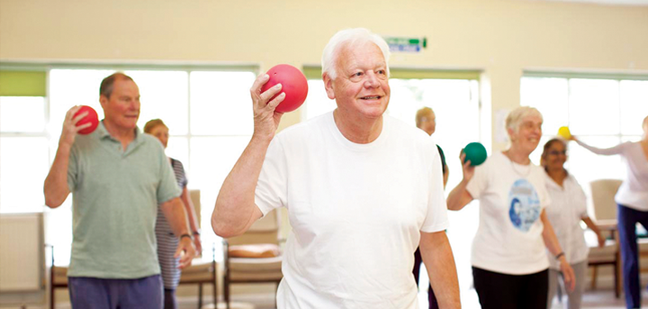 Older people enjoying an exercise class