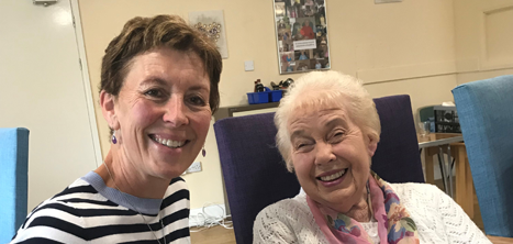 Volunteer and member enjoying a day at an Age UK Shropshire Telford & Wrekin day centre.