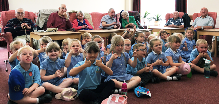 Children from Mount Pleasant Primary School visiting Castlefields day centre in Shrewsbury.